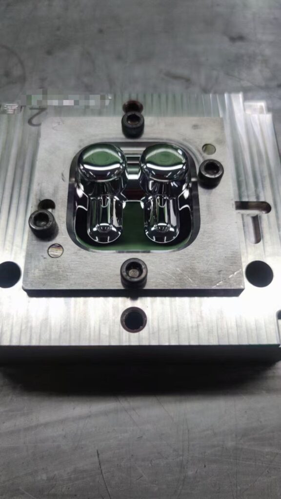 Bluetooth earphone mold insert with mirror surface