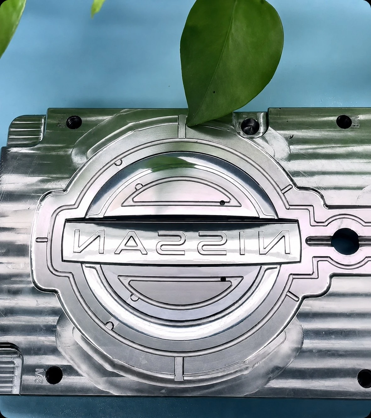Automotive emblem mold insert