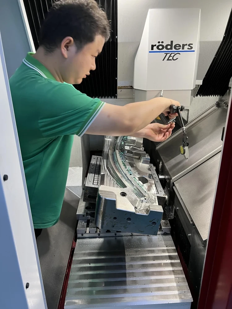 YISHUN operator working on automotive optical mold machining project