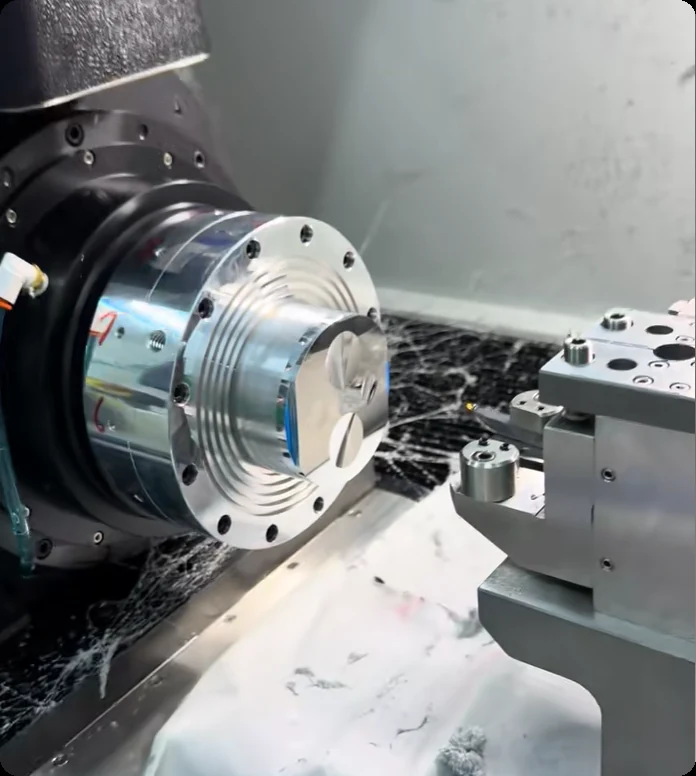 Real close-up of rotating optical mold insert and diamond cutting tool
