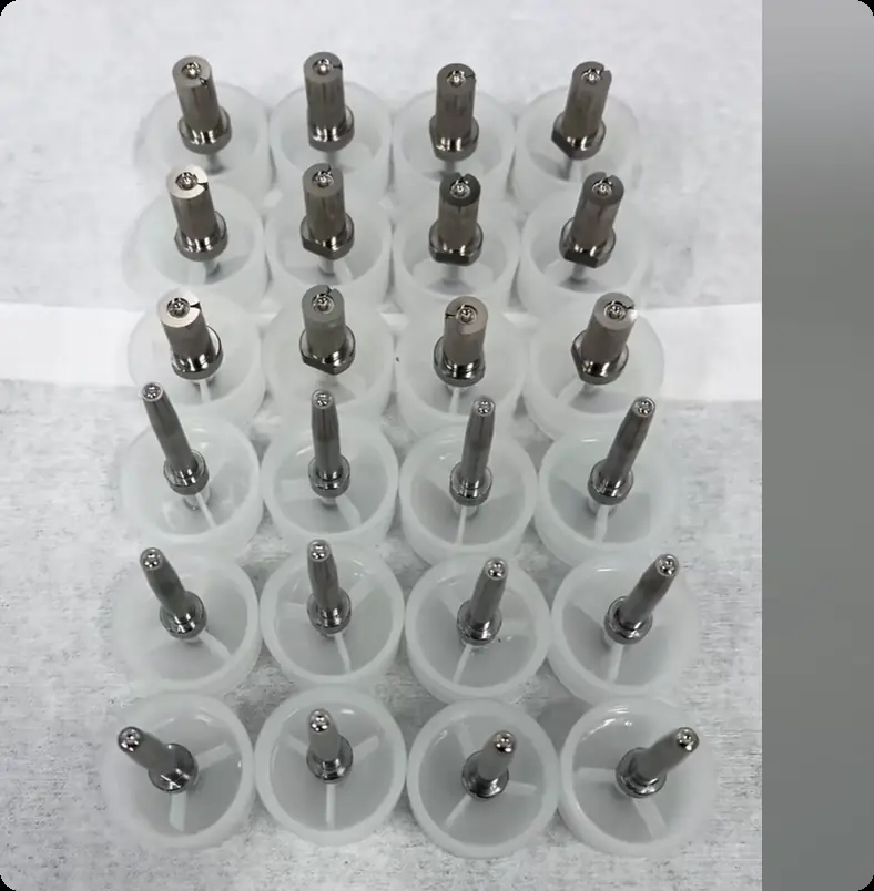 Batch of small precision optical mold components in protective holders