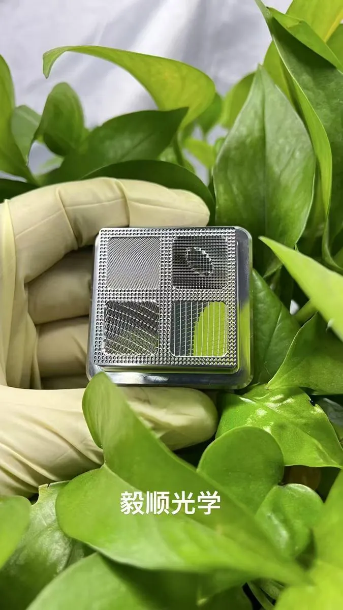 Four-zone compound microstructure mold insert