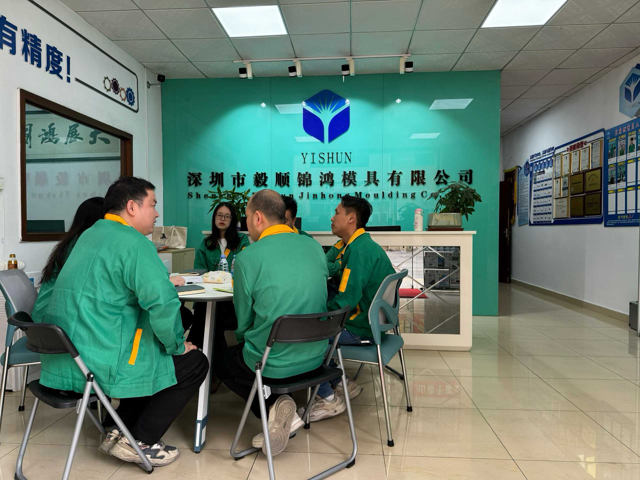 Yishun engineering team reviewing drawings and discussing project feasibility