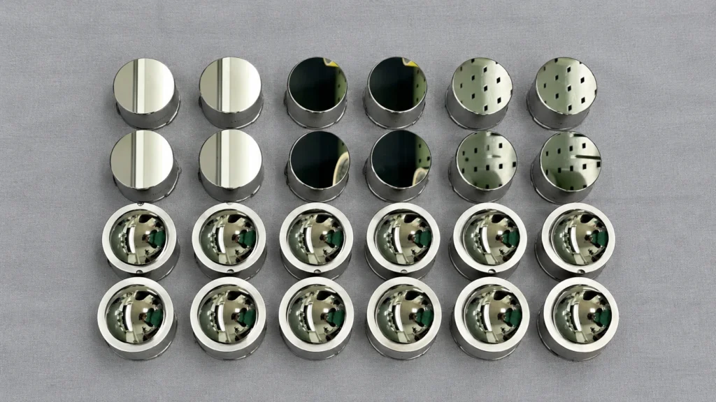 Multiple mirror-finished precision components showing machining consistency