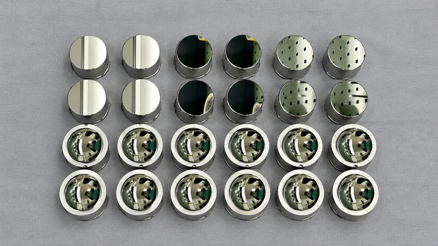 Multiple mirror-finished precision components showing machining consistency